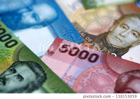 Big amount of chilean pesos money bills banknotes. Huge quantity of paper money from Chile country close up. Concept of business and economy in Chile 138153059