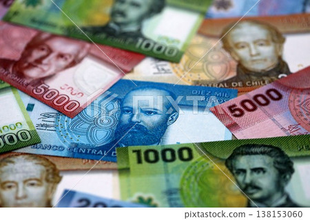 Big amount of chilean pesos money bills banknotes. Huge quantity of paper money from Chile country close up. Concept of business and economy in Chile 138153060