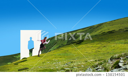 Businesswoman running out of human silhouette cutout on green hills. 138154501