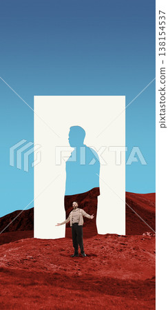 Man standing in red landscape under human silhouette cutout shape Man standing in red landscape under human silhouette cutout shape 138154537