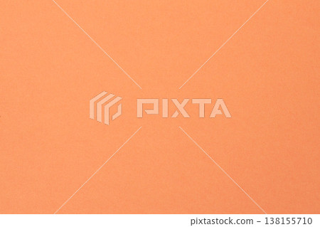 Smooth coral peach paper background with warm pastel tones for minimalist design concept Smooth coral peach paper background with warm pastel tones for minimalist design concept 138155710