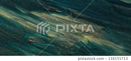 Abstract teal and gold brushstroke texture with diagonal flowing paint pattern for background Abstract teal and gold brushstroke texture with diagonal flowing paint pattern for background 138155713