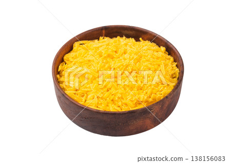 Shredded cheese closeup in bowl isolated on white background cooking ingredient texture for meals snacks and homemade dishes. 138156083