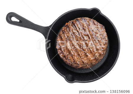 Grilled beef and lamb hamburger patty with seared crust and juicy texture in cast iron skillet. Cooked mixed meat on isolated background. Grilled beef and lamb hamburger patty with seared crust and juicy texture in cast iron skillet. Cooked mixed meat on isolated background. 138156096