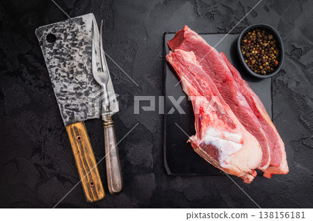 Raw beef rib cut with bone, marrow and connective tissue, perfect for simmering rich homemade broth and traditional stock. Raw beef rib cut with bone, marrow and connective tissue, perfect for simmering rich homemade broth and traditional stock. 138156181