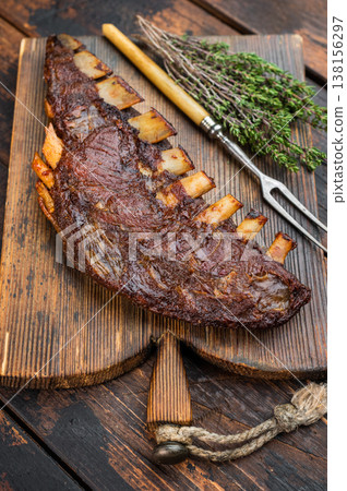 Smoked and grilled lamb breast ribs with crispy crust isolated on white background meat cutout Smoked and grilled lamb breast ribs with crispy crust isolated on white background meat cutout 138156297