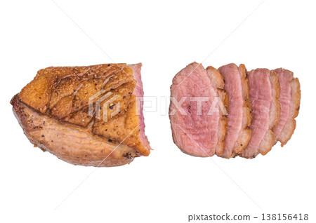 Sliced cooked duck breast with crispy skin on white background showcasing juicy tender meat ideal for gourmet food stock images. 138156418