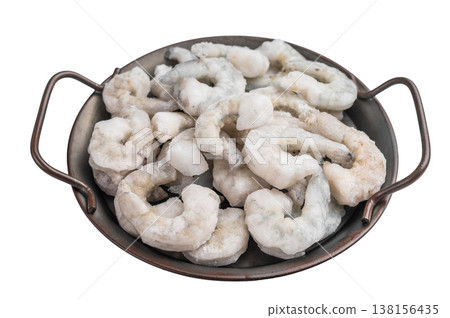 Top view of frozen raw prawns shrimp in a rustic metal bowl, isolated on a clean white background. Perfect for commercial use. 138156435