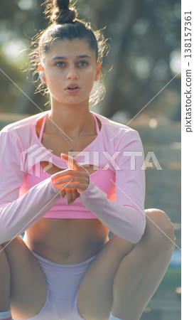 Elegant warmup with expressive movements during sunset hours Elegant warmup with expressive movements during sunset hours 138157361