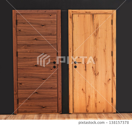 Dark and light wooden closed doors Dark and light wooden closed doors 138157378