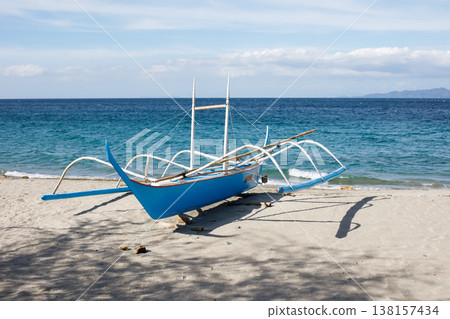 Colorful traditional banca boat by the ocean Colorful traditional banca boat by the ocean 138157434