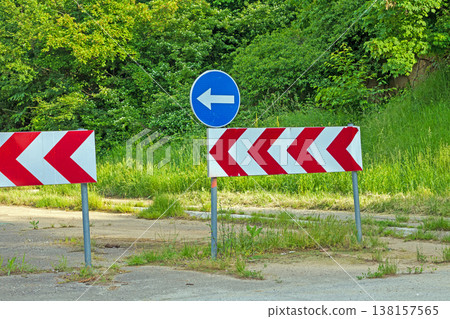 Traffic signs outside on the road 138157565