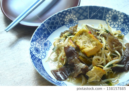 fried bean sprout with slice yellow tofu and black ear mushroom Chinese vegetarian food on plate fried bean sprout with slice yellow tofu and black ear mushroom Chinese vegetarian food on plate 138157885