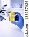 in a lab a man holds a urine sample, generative AI 138157926