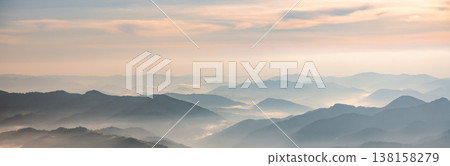 Landscape panorama with morning fog in spring mountains Landscape panorama with morning fog in spring mountains 138158279