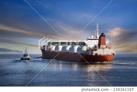 Pilot boat meeting a Liquid Petrolium Gas tanker to lead safely it into port 138161107