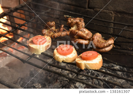 Cow bowels presented on a grill. Argentine Traditional cuisine. Cow bowels presented on a grill. Argentine Traditional cuisine. 138161307
