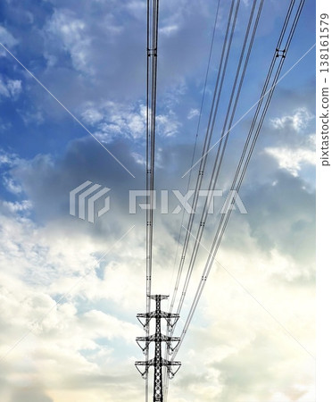 The transmission towers, symbolizing electrical infrastructure, and the dynamic appearance of the clouds. The transmission towers, symbolizing electrical infrastructure, and the dynamic appearance of the clouds. 138161579