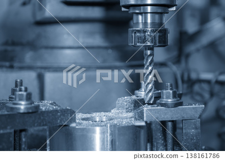 Heavy-duty rough cutting process on metal parts using an NC milling machine with a flat nose end mill tool. 138161786