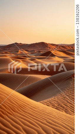 Panoramic desert dunes landscape at sunset background with golden ripples and soft shadows for travel wallpaper and banner Panoramic desert dunes landscape at sunset background with golden ripples and soft shadows for travel wallpaper and banner 138162206