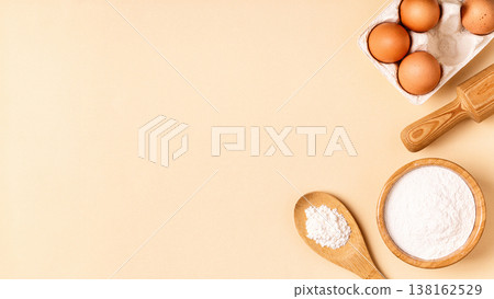 Ingredients and utensils for baking on a pastel background. Ingredients and utensils for baking on a pastel background. 138162529