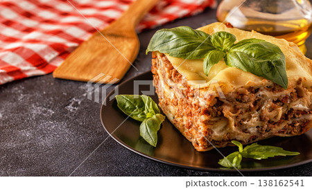 Traditional lasagna made with minced beef bolognese sauce and bechamel sauce. 138162541