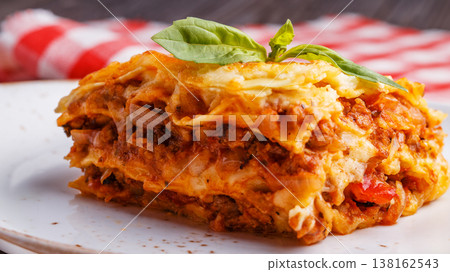 Traditional lasagna made with minced beef bolognese sauce Traditional lasagna made with minced beef bolognese sauce 138162543