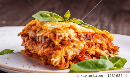 Traditional lasagna made with minced beef bolognese sauce Traditional lasagna made with minced beef bolognese sauce 138162544