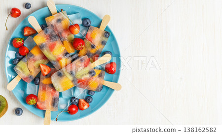 Homemade popsicles with berries and fruits. Homemade popsicles with berries and fruits. 138162582