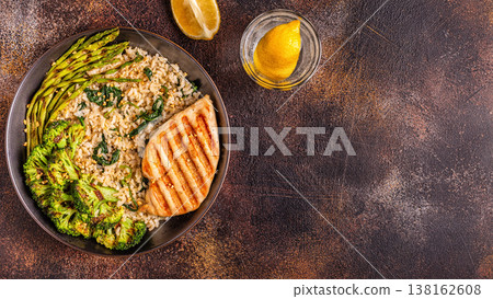 Grilled chicken breast with brown rice, spinach, broccoli, asparagus Grilled chicken breast with brown rice, spinach, broccoli, asparagus 138162608
