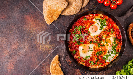Shakshuka in a Frying Pan. 138162614