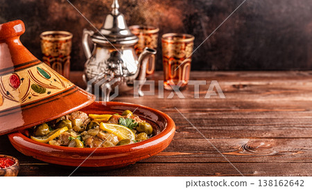 Traditional Moroccan chicken tagine with olives and salted lemons 138162642