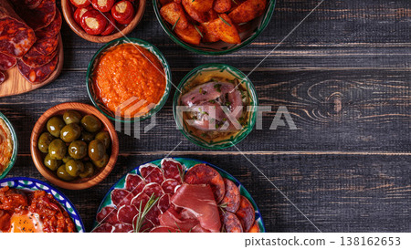 Typical spanish tapas concept, rustic style,  top view. 138162653