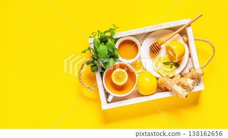 Green tea with lemon and honey. Green tea with lemon and honey. 138162656