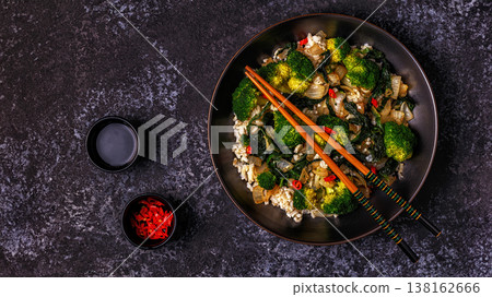 Cooking asian stir fry rice with vegetables Cooking asian stir fry rice with vegetables 138162666