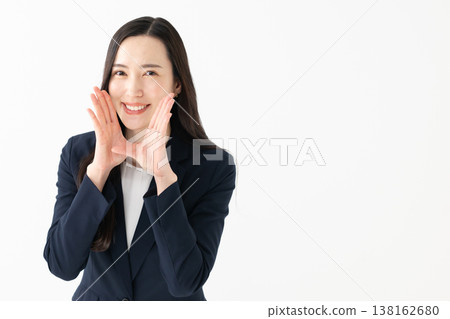 Female employees cheering Female employees cheering 138162680
