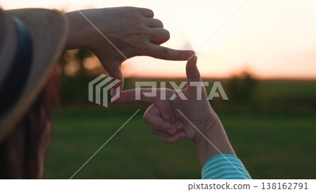 woman showing frame sign with hands, happy woman traveler sunset, female freedom, people outdoors nature, imagine better tomorrow, cinematic framing gesture, defining life goals, thinking outside box 138162791