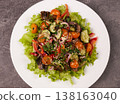 Ready salad in a plate. 138163040