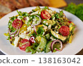 Ready salad in a plate. 138163042