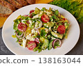 Ready salad in a plate. 138163044
