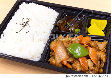 Delicious Chinese bento box with stir-fried chicken and vegetables Delicious Chinese bento box with stir-fried chicken and vegetables 138163341