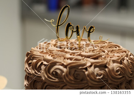 Layered Chocolate Wedding Cake With Swirled Frosting 138163355