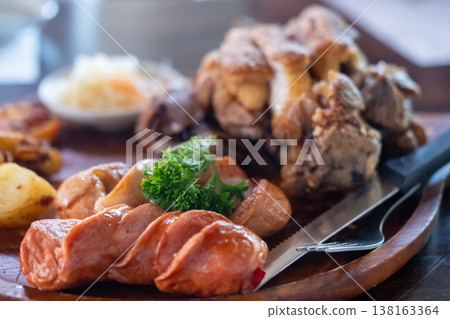 Crispy German pork knuckle served in the restaurant 138163364