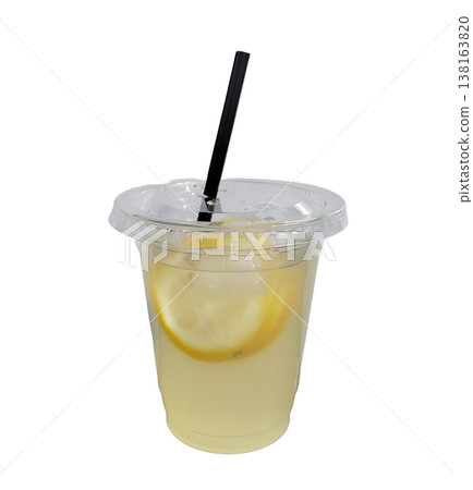 A refreshing iced lemonade with ice and lemon slices, served in a plastic cup with a lid and a black straw. A refreshing iced lemonade with ice and lemon slices, served in a plastic cup with a lid and a black straw. 138163820