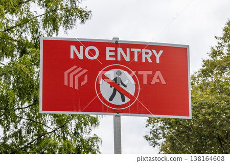 Red no entry warning sign with pedestrian restriction symbol Red no entry warning sign with pedestrian restriction symbol 138164608