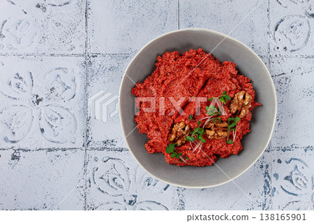 Mahammara red pepper sauce, with walnuts, and sprigs of fresh microgreens, homemade, no people, 138165901