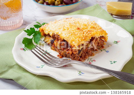 Greek dish moussaka, baked eggplant with minced meat, with bechamel sauce, home cooking, Greek dish moussaka, baked eggplant with minced meat, with bechamel sauce, home cooking, 138165918