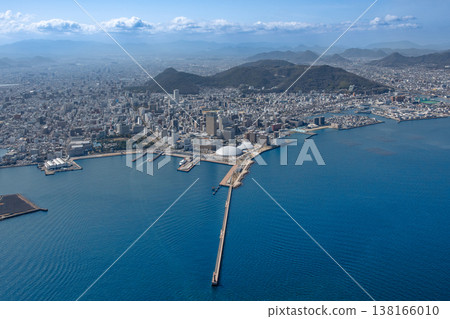View of Takamatsu city, Kagawa Prefecture, from above the Seto Inland Sea. View of Takamatsu city, Kagawa Prefecture, from above the Seto Inland Sea. 138166010