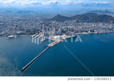 View of Takamatsu city, Kagawa Prefecture, from above the Seto Inland Sea. View of Takamatsu city, Kagawa Prefecture, from above the Seto Inland Sea. 138166011