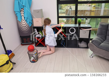 Organizing toys and supplies in a bright modern room on a sunny afternoon enhances creativity and playfulness 138166233